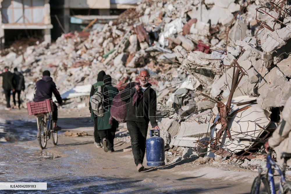 Displaced Palestinians live in partially demolished buildings - Gaza