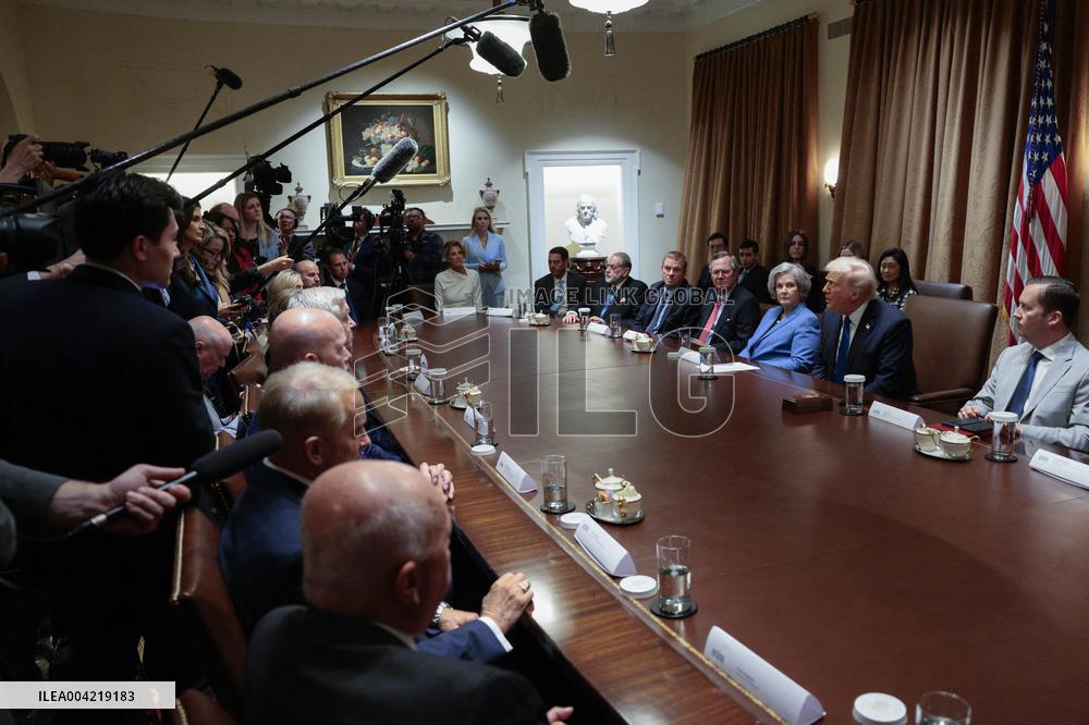 US President Donald J. Trump delivers remarks to the news media during an Ambassador meeting