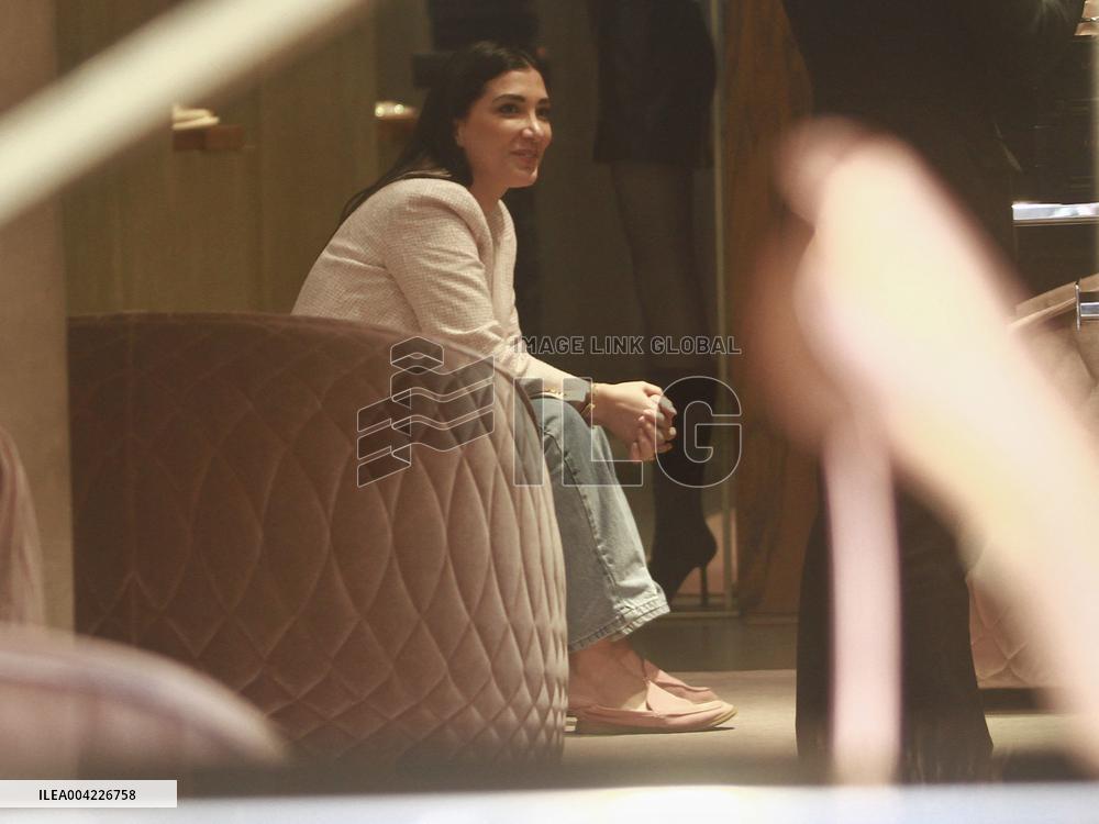 Keita Balde and Simona Guatieri hand in hand in Milan