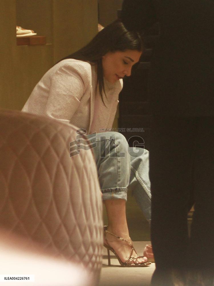 Keita Balde and Simona Guatieri hand in hand in Milan