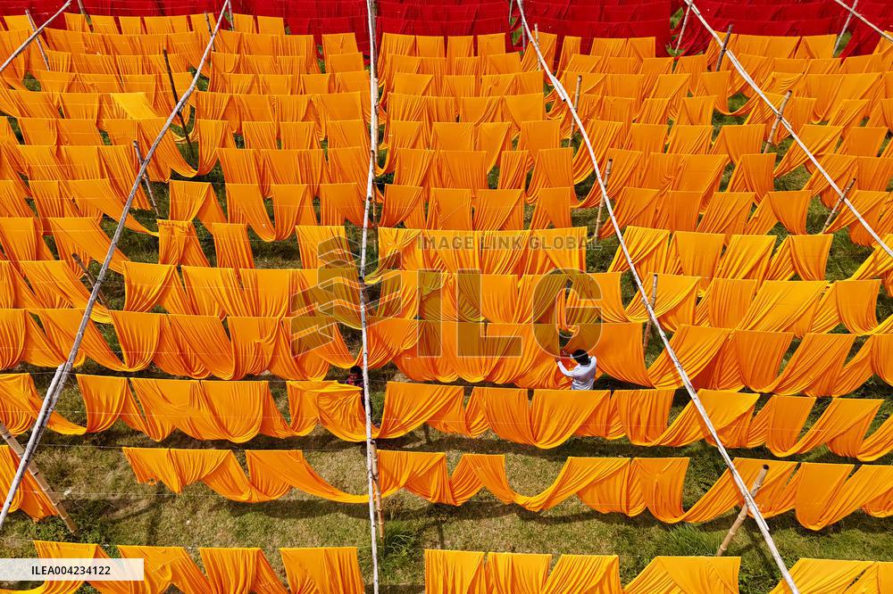 Drying of Meters Colorful Fabrics - Bangladesh