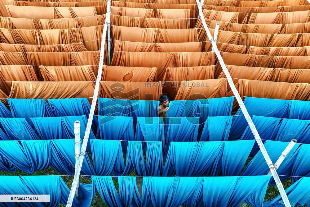 Drying of Meters Colorful Fabrics - Bangladesh