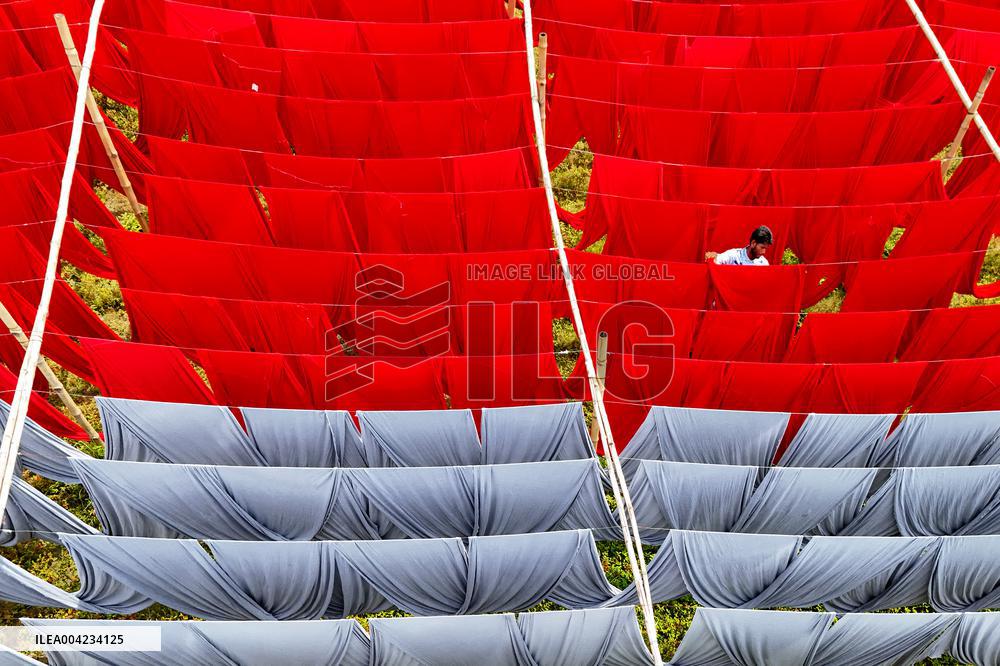 Drying of Meters Colorful Fabrics - Bangladesh