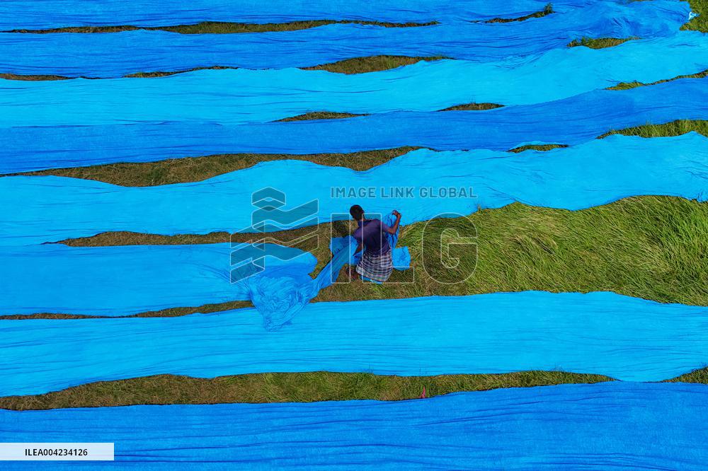 Drying of Meters Colorful Fabrics - Bangladesh