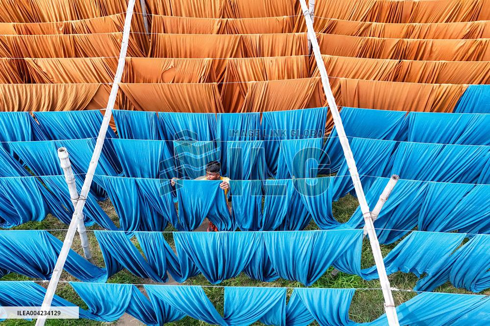 Drying of Meters Colorful Fabrics - Bangladesh