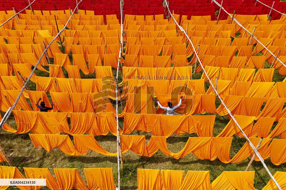Drying of Meters Colorful Fabrics - Bangladesh