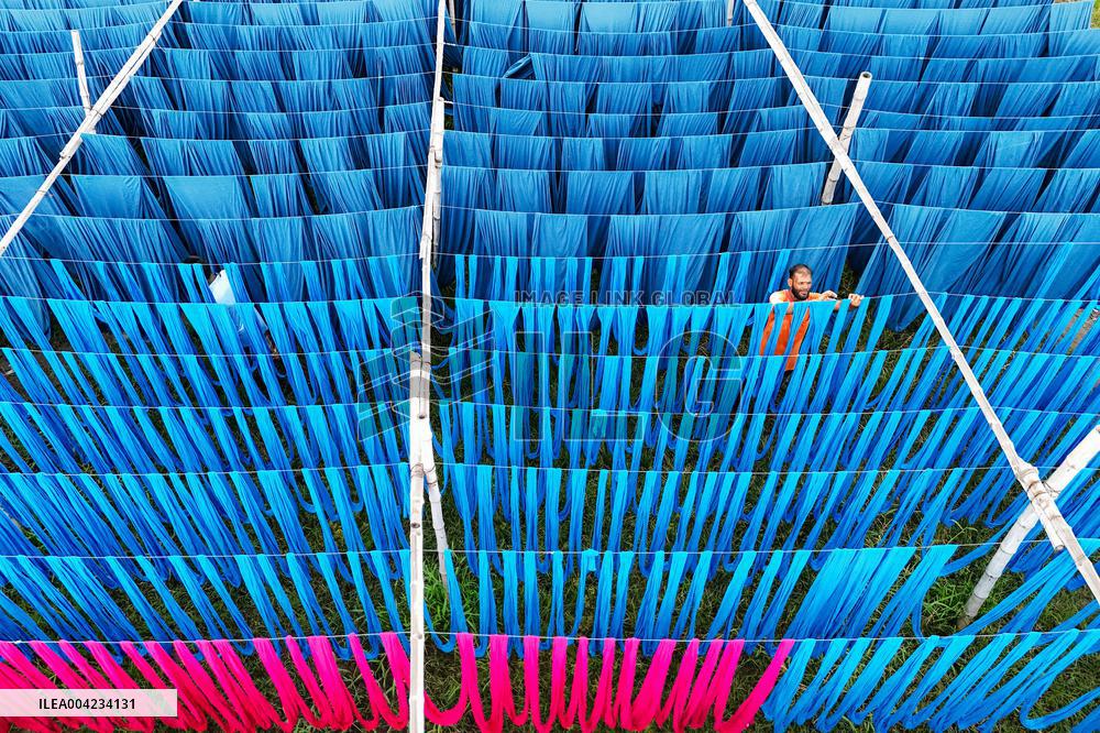 Drying of Meters Colorful Fabrics - Bangladesh