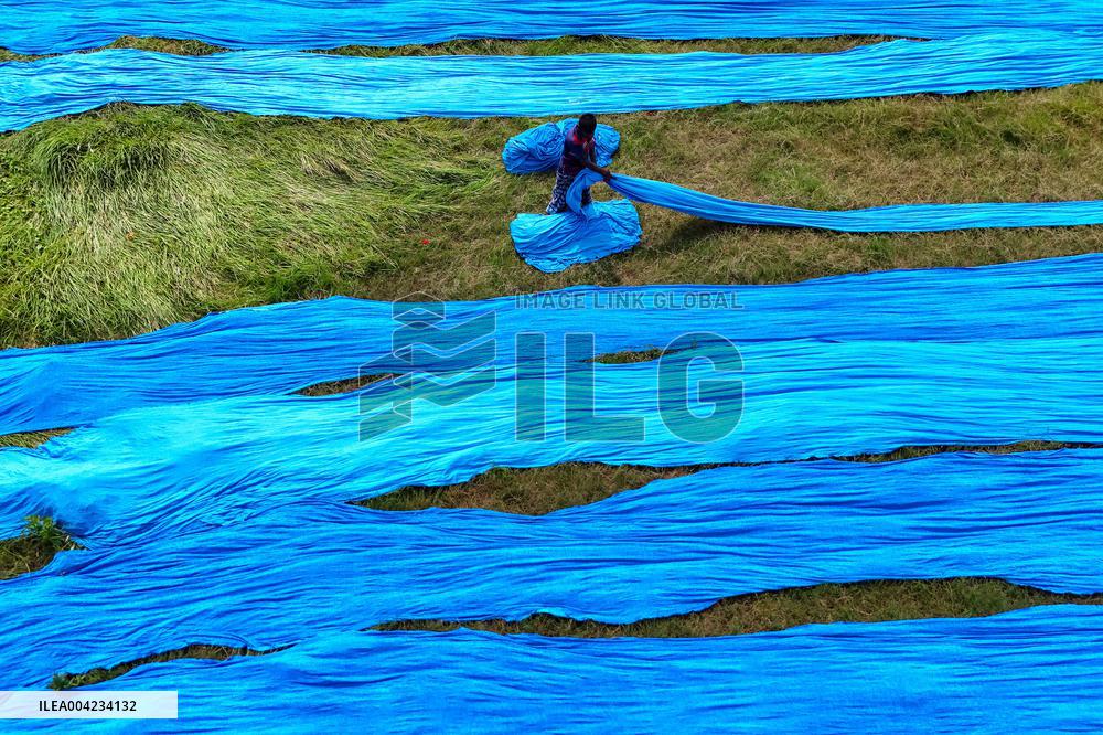 Drying of Meters Colorful Fabrics - Bangladesh