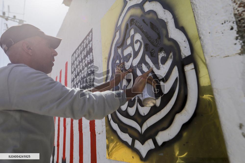 Walls of Gaza Speak Against U.S. Arms