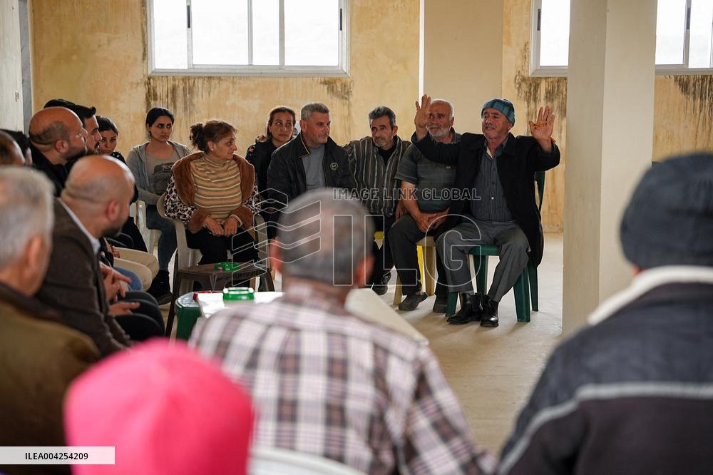 Members of the Syrian Sect visit people affected recently violence in Latakia - Syria