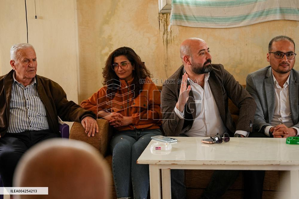 Members of the Syrian Sect visit people affected recently violence in Latakia - Syria