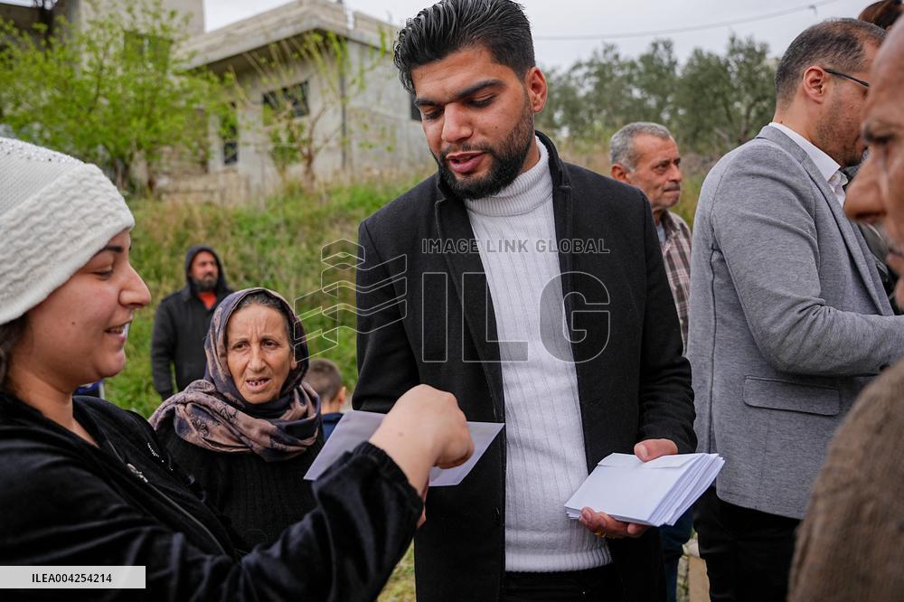 Members of the Syrian Sect visit people affected recently violence in Latakia - Syria