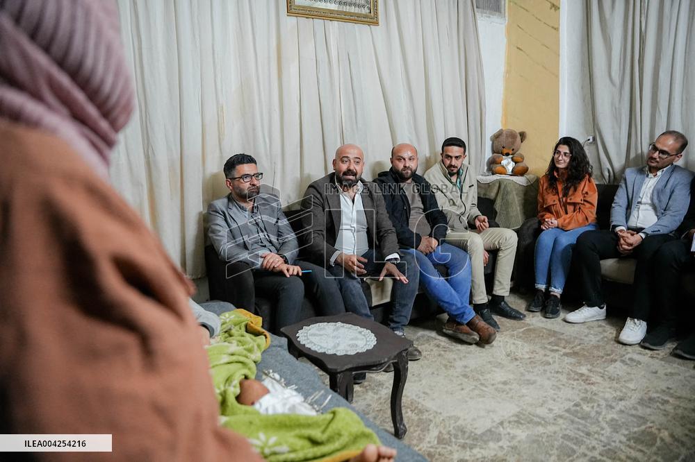 Members of the Syrian Sect visit people affected recently violence in Latakia - Syria