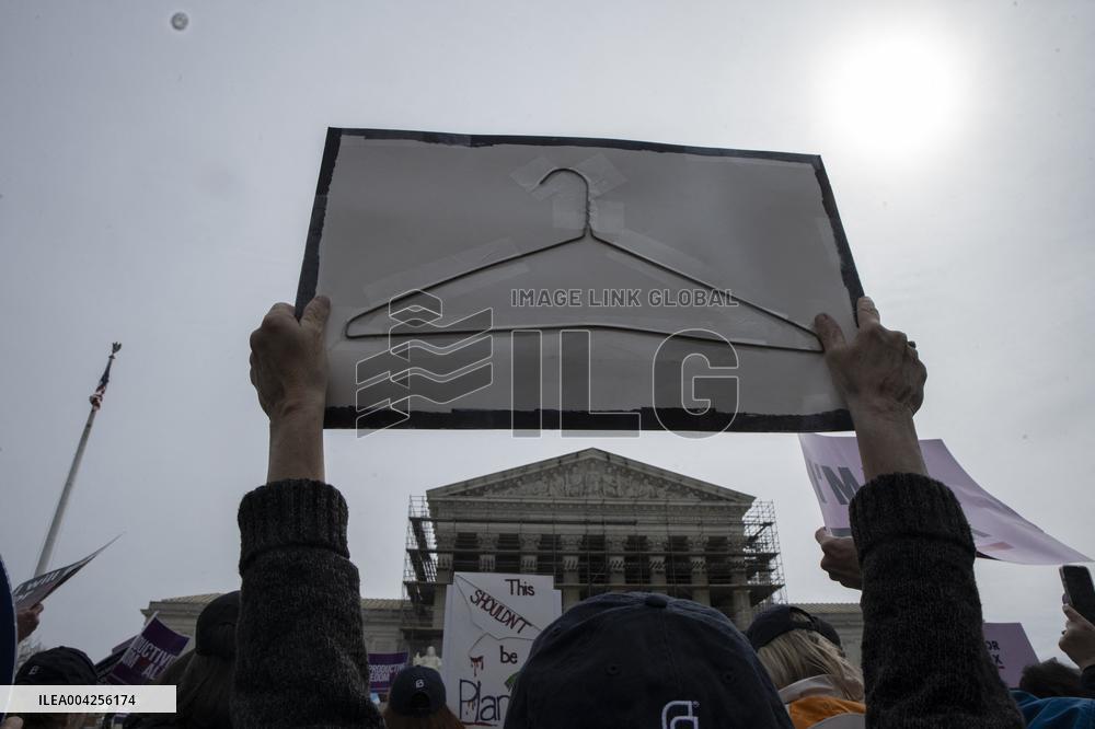 Protestors rally in support of Planned Parenthood, in front of the Supreme Court