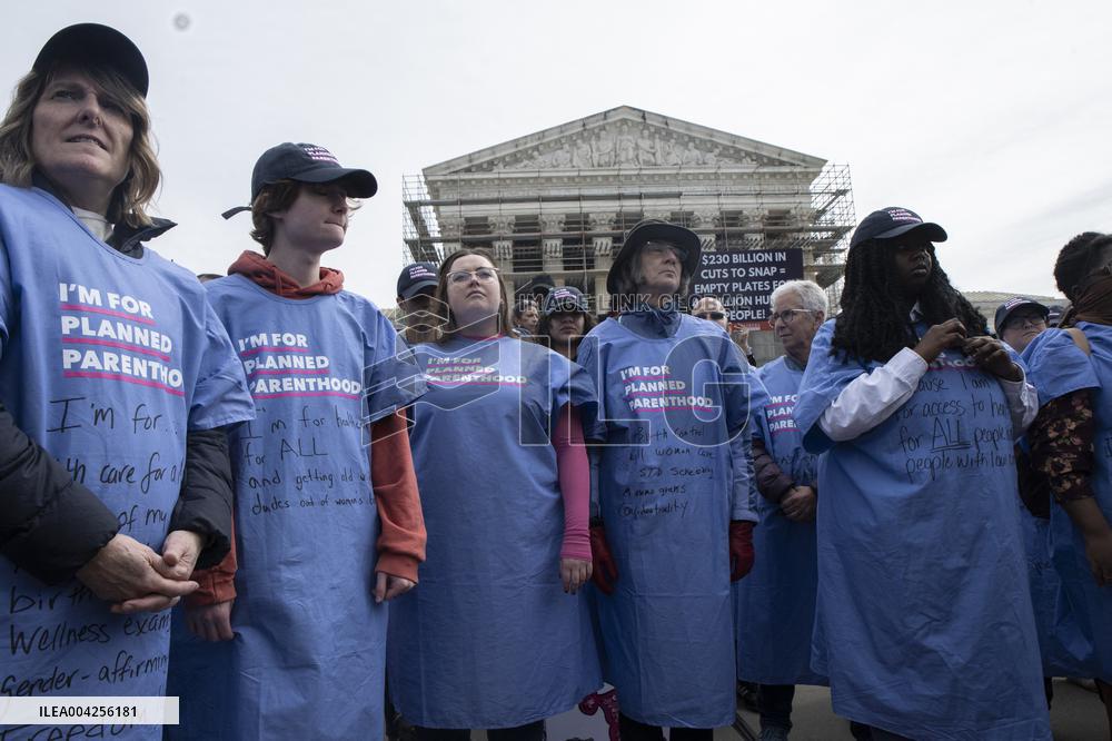 Protestors rally in support of Planned Parenthood, in front of the Supreme Court