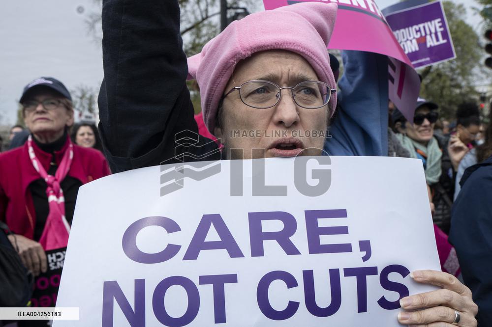 Protestors rally in support of Planned Parenthood, in front of the Supreme Court