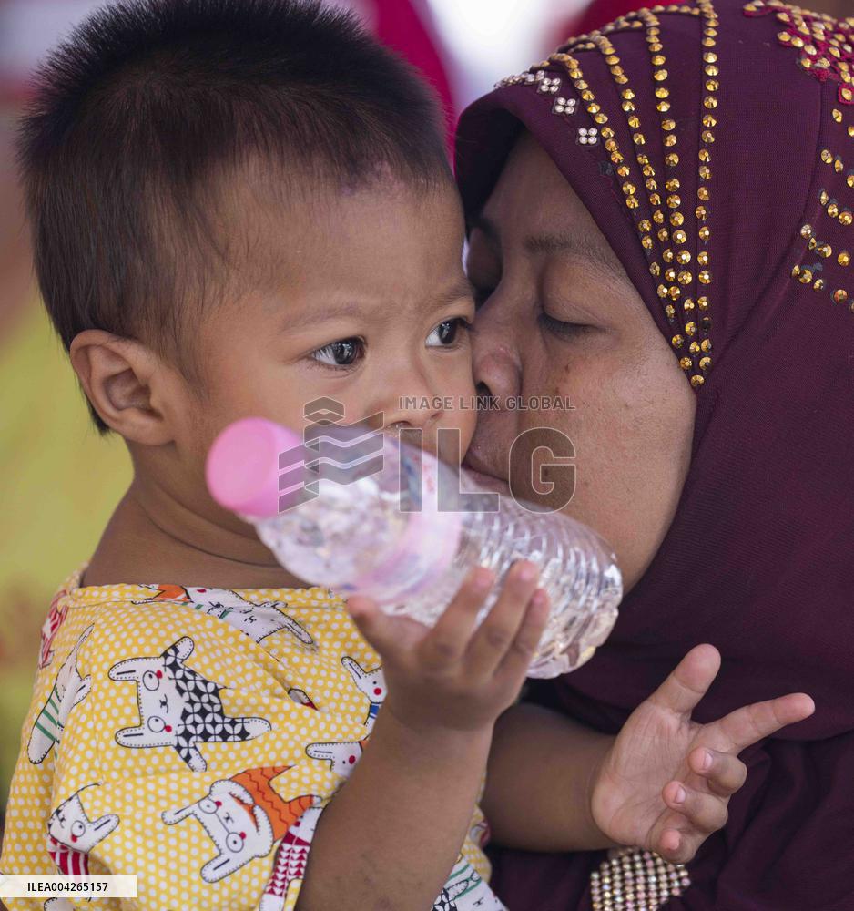 Situation of quake-affected people at a shelter in Mandalay