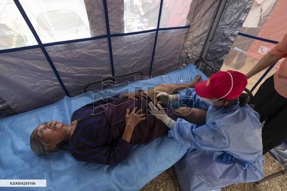 Situation of quake-affected people at a shelter in Mandalay