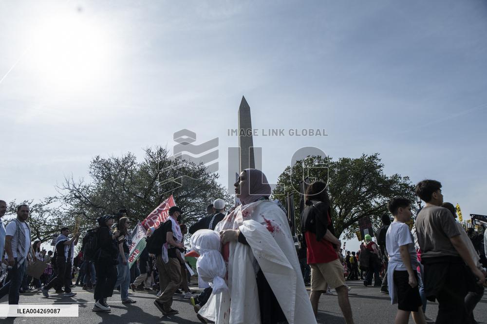 Pro-Palestinian protestors march from the National Gallery to ICE Headquarters in Washington, DC, on Saturday April 5, 2025. Thi