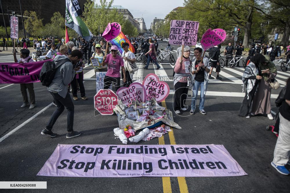 Pro-Palestinian protestors march from the National Gallery to ICE Headquarters in Washington, DC, on Saturday April 5, 2025. Thi