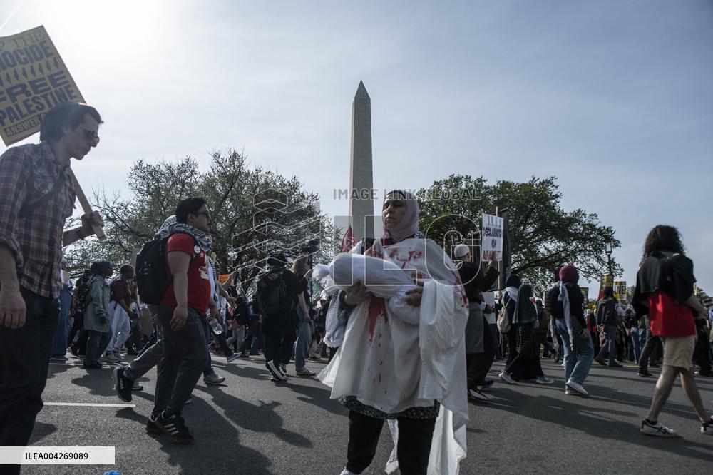 Pro-Palestinian protestors march from the National Gallery to ICE Headquarters in Washington, DC, on Saturday April 5, 2025. Thi