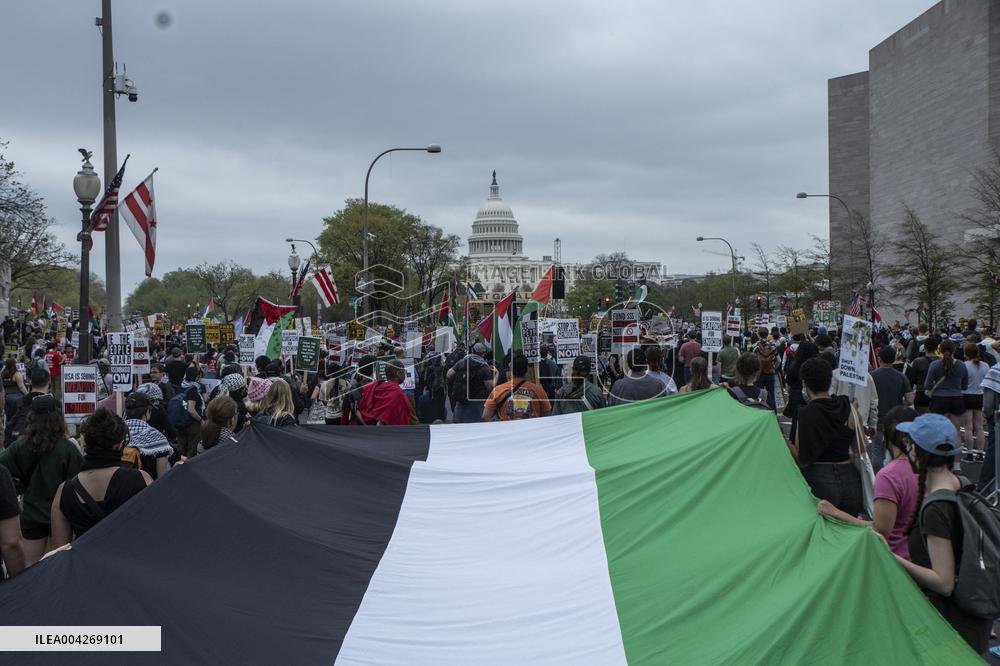 Pro-Palestinian protestors march from the National Gallery to ICE Headquarters in Washington, DC, on Saturday April 5, 2025. Thi