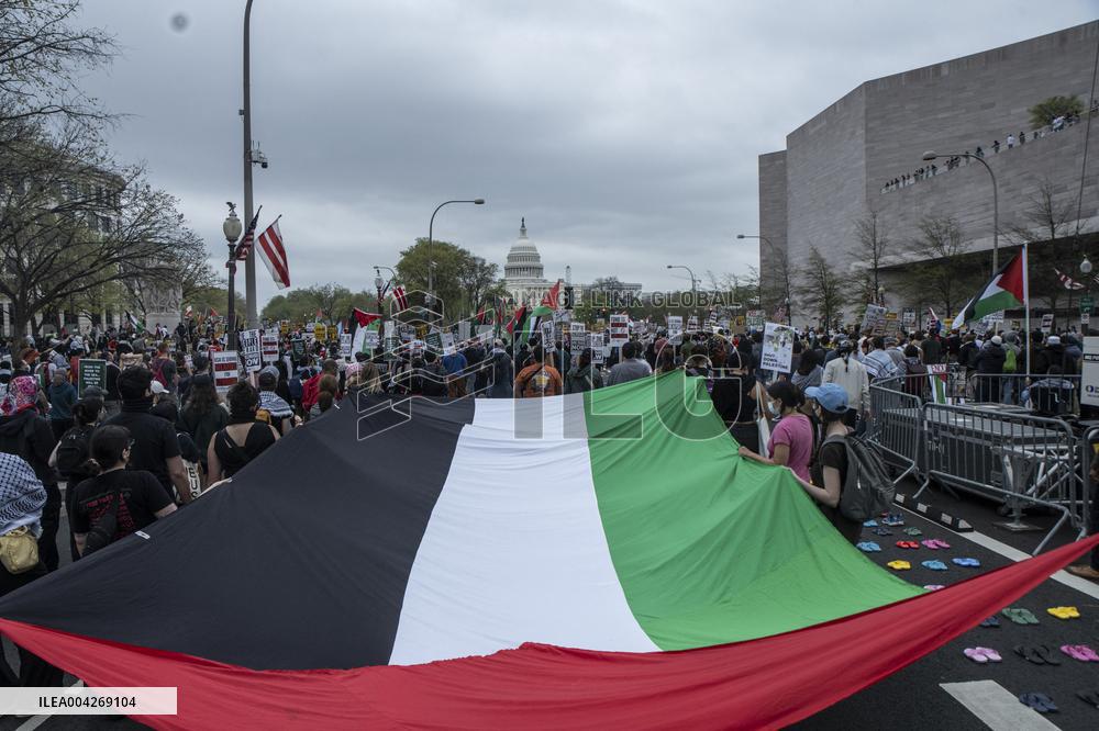 Pro-Palestinian protestors march from the National Gallery to ICE Headquarters in Washington, DC, on Saturday April 5, 2025. Thi