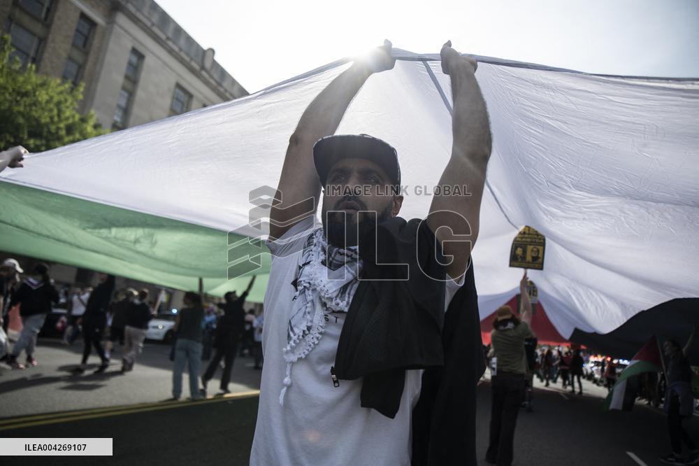 Pro-Palestinian protestors march from the National Gallery to ICE Headquarters in Washington, DC, on Saturday April 5, 2025. Thi