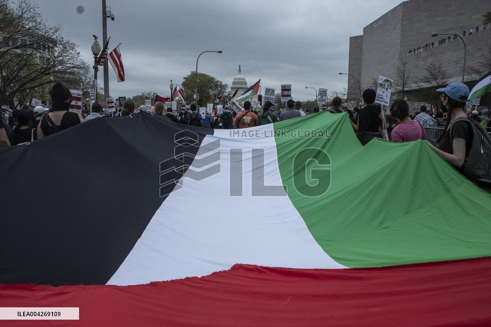 Pro-Palestinian protestors march from the National Gallery to ICE Headquarters in Washington, DC, on Saturday April 5, 2025. Thi