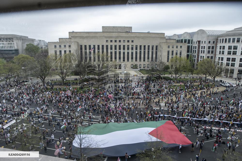 Pro-Palestinian protestors march from the National Gallery to ICE Headquarters in Washington, DC, on Saturday April 5, 2025. Thi