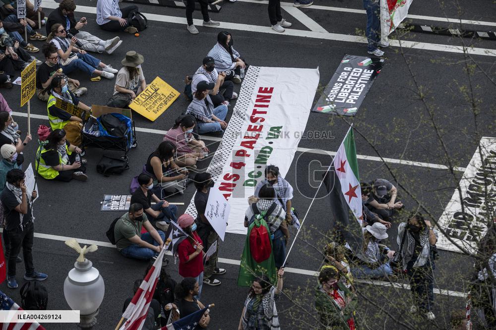 Pro-Palestinian protestors march from the National Gallery to ICE Headquarters in Washington, DC, on Saturday April 5, 2025. Thi
