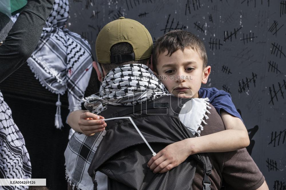 Pro-Palestinian protestors march from the National Gallery to ICE Headquarters in Washington, DC, on Saturday April 5, 2025. Thi