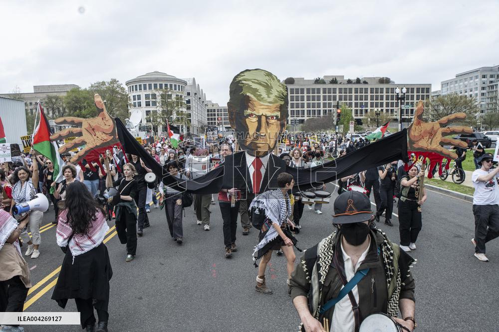 Pro-Palestinian protestors march from the National Gallery to ICE Headquarters in Washington, DC, on Saturday April 5, 2025. Thi