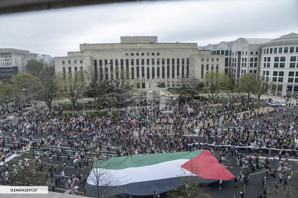 Pro-Palestinian protestors march from the National Gallery to ICE Headquarters in Washington, DC, on Saturday April 5, 2025. Thi