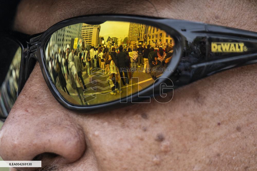 Pro-Palestinian protestors march from the National Gallery to ICE Headquarters in Washington, DC, on Saturday April 5, 2025. Thi