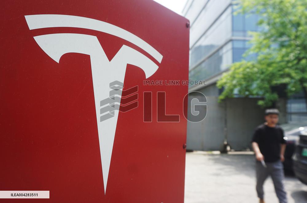 Tesla Shares Fall As Tariffs Hit