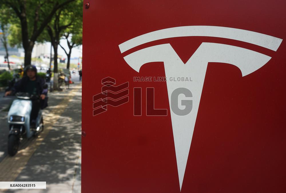 Tesla Shares Fall As Tariffs Hit