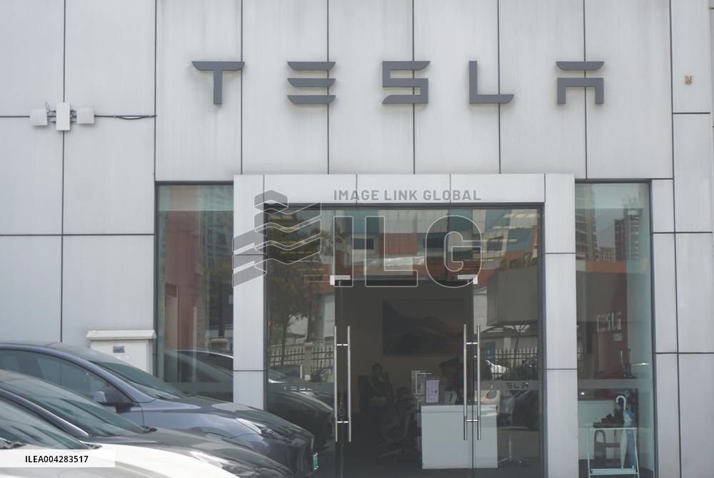 Tesla Shares Fall As Tariffs Hit