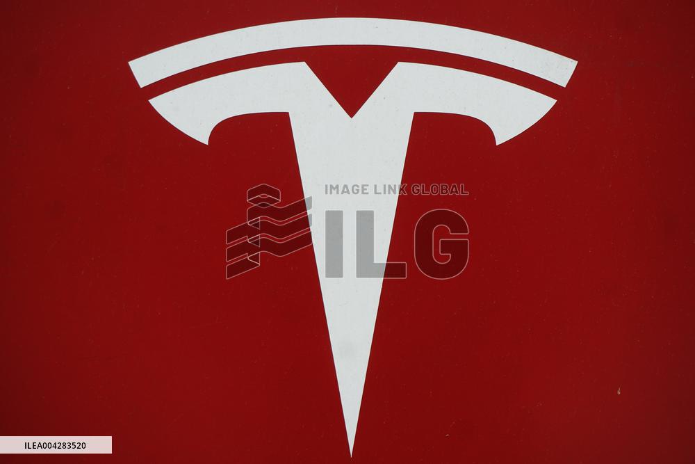 Tesla Shares Fall As Tariffs Hit