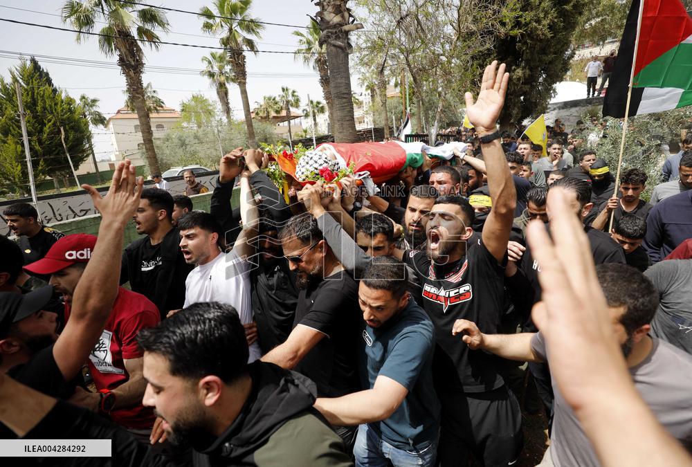 Protest against the ongoing Israeli assaults during funeral - West Bank