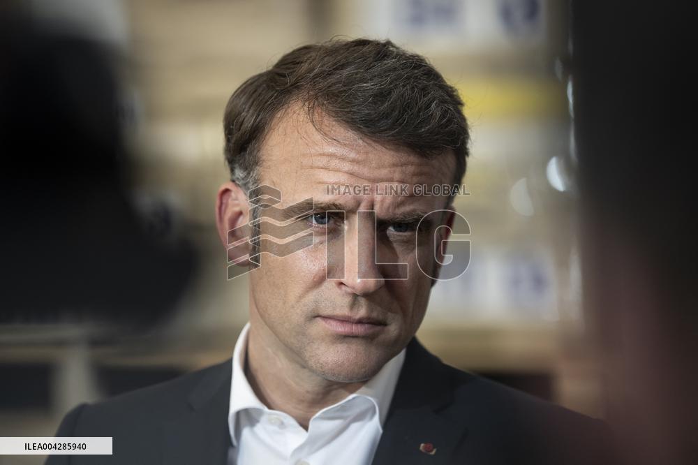 Macron talks to the media during a visit at Egyptian Red Crescent - Egypt