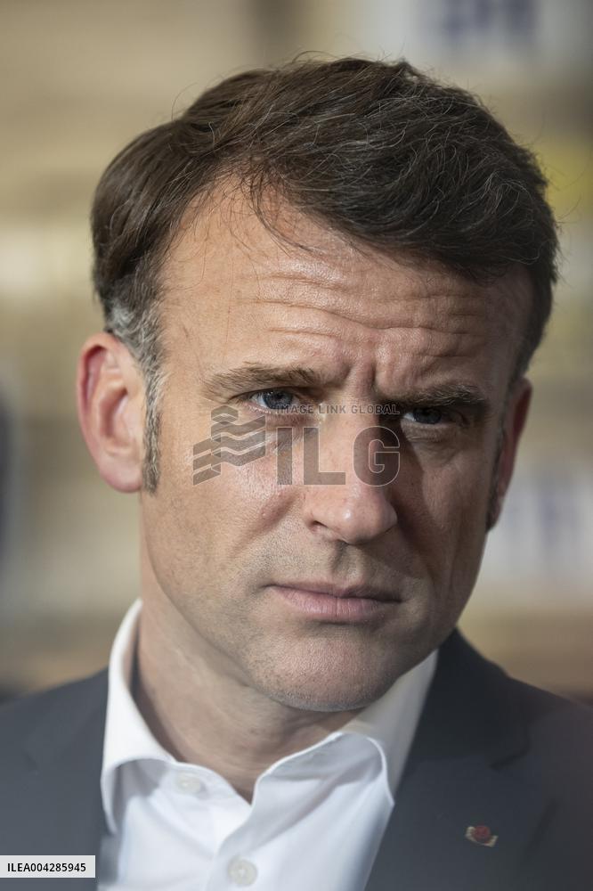 Macron talks to the media during a visit at Egyptian Red Crescent - Egypt