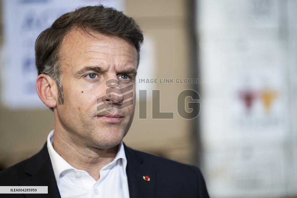 Macron talks to the media during a visit at Egyptian Red Crescent - Egypt