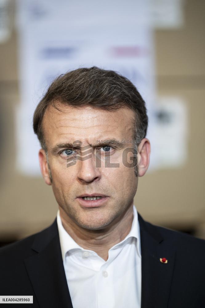 Macron talks to the media during a visit at Egyptian Red Crescent - Egypt
