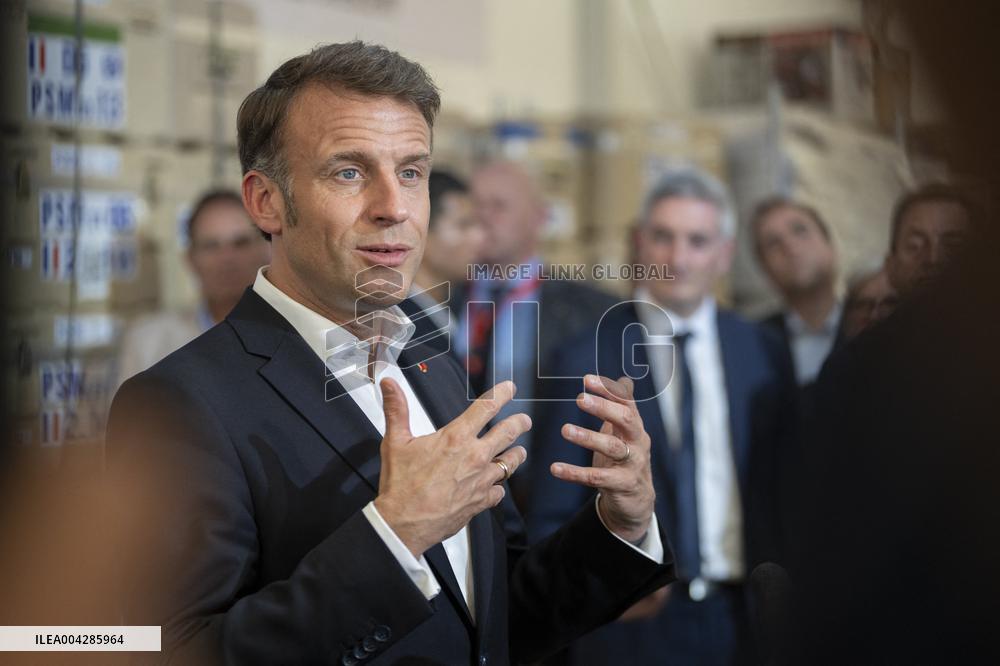 Macron talks to the media during a visit at Egyptian Red Crescent - Egypt