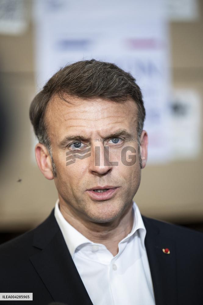 Macron talks to the media during a visit at Egyptian Red Crescent - Egypt