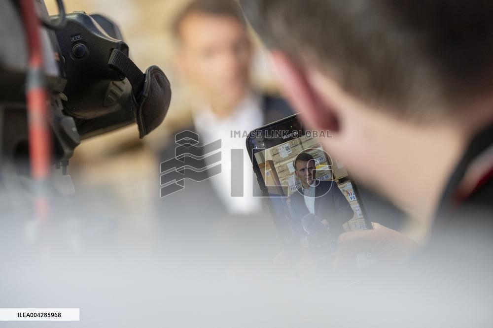 Macron talks to the media during a visit at Egyptian Red Crescent - Egypt