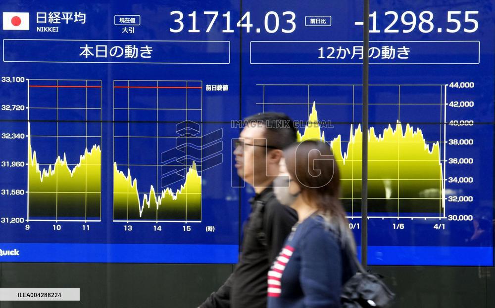 Tokyo stocks tumble