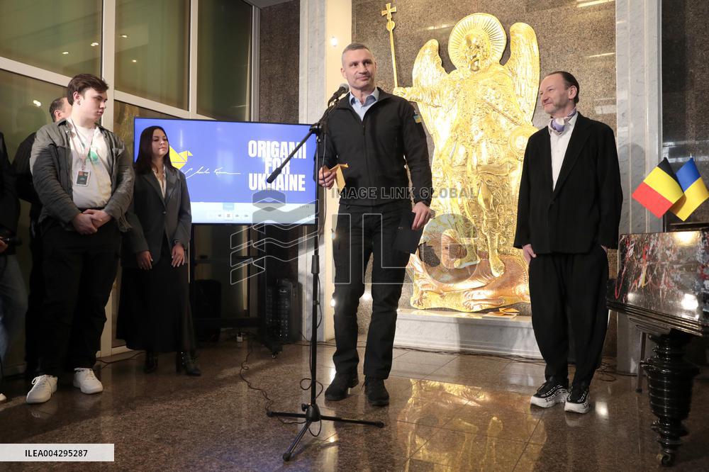 Art installation of 5,000 origami birds set up on facade of  Museum of Kyiv History