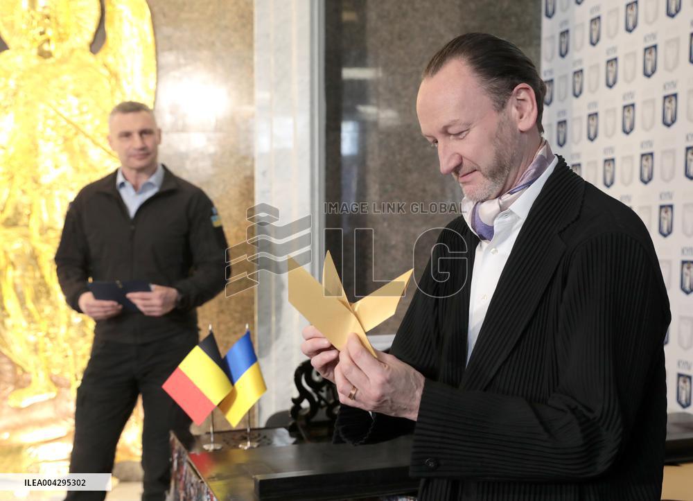 Art installation of 5,000 origami birds set up on facade of  Museum of Kyiv History